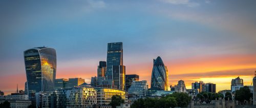 Skyline of The City in London, England at sunrise london leadership event