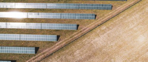 Solar panels. Solar Power station with a Clear Blue Sky and Sun Rays.