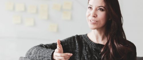 Woman discussing ideas and strategy in studio office