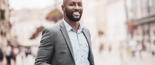 Businessman looking navigation on smart phone