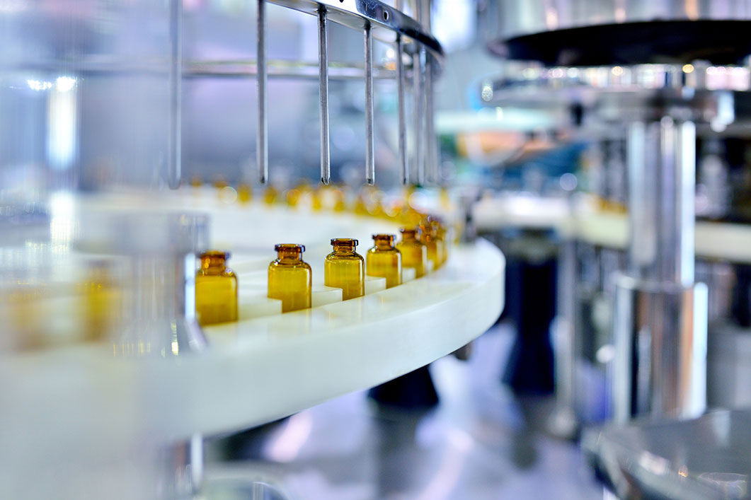 Brown Glass Bottle Filling at Production Line