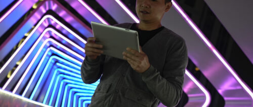 Asian business men use tablets on the overpass